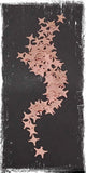 Rose Gold starburst stars